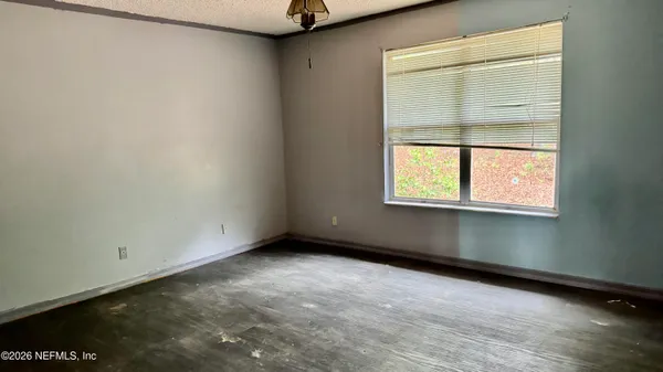 an empty room with a window