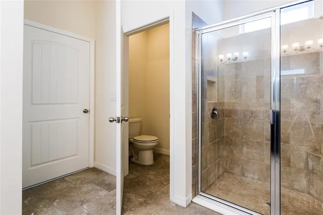 an empty room with closet area