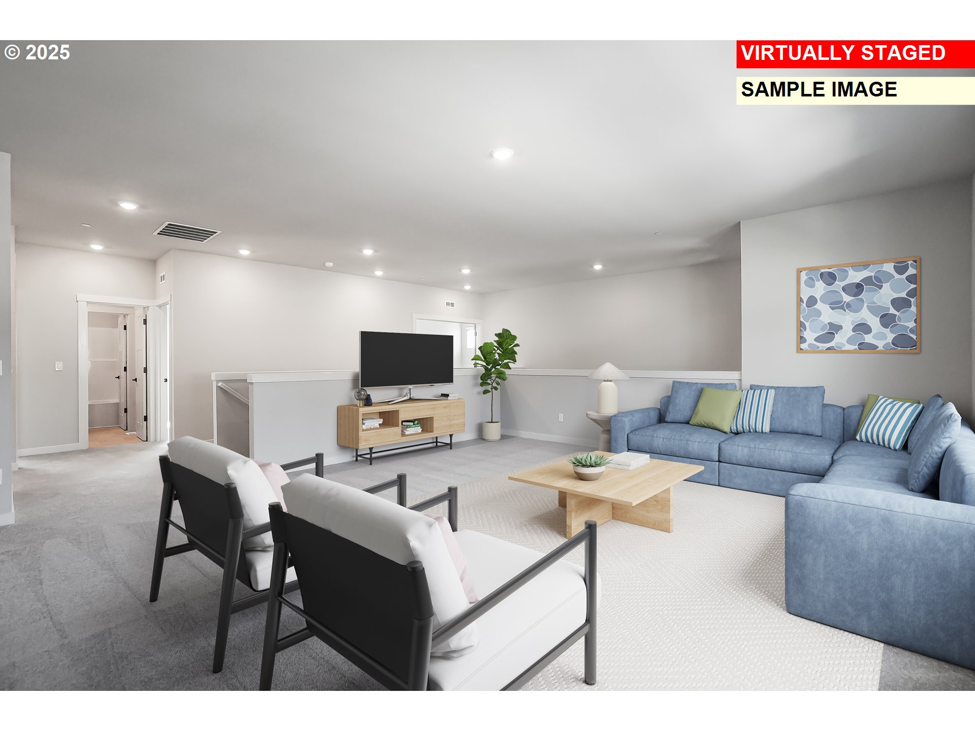 5486 North 88th Avenue Camas, WA 98607 - Photo 14 of 28 a living room with furniture a flat screen tv and a table