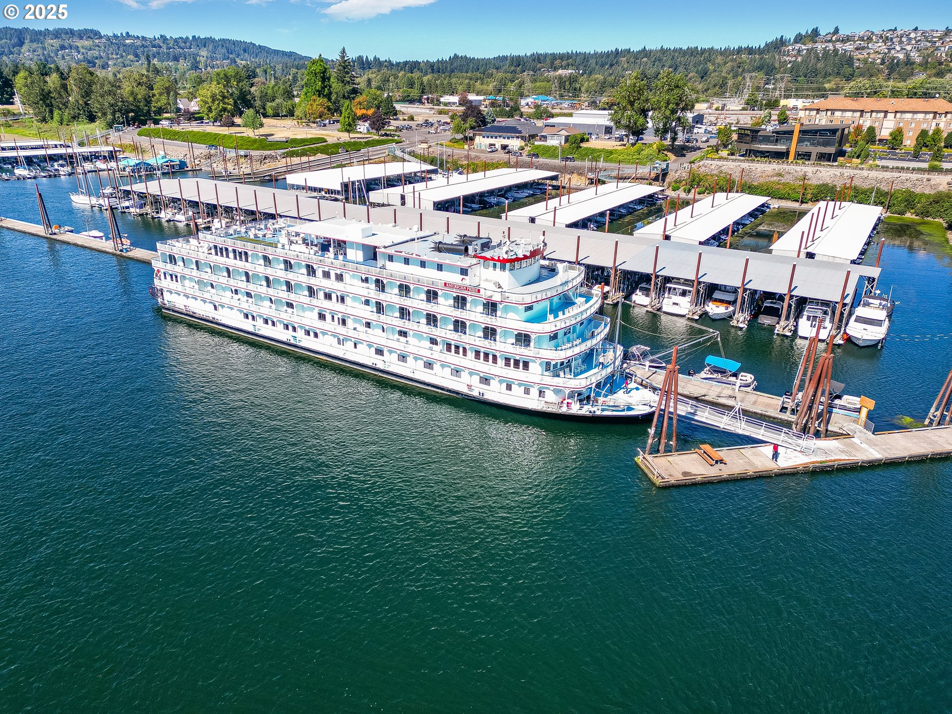 5486 North 88th Avenue Camas, WA 98607 - Photo 25 of 28 an aerial view of a house with a garden and lake view