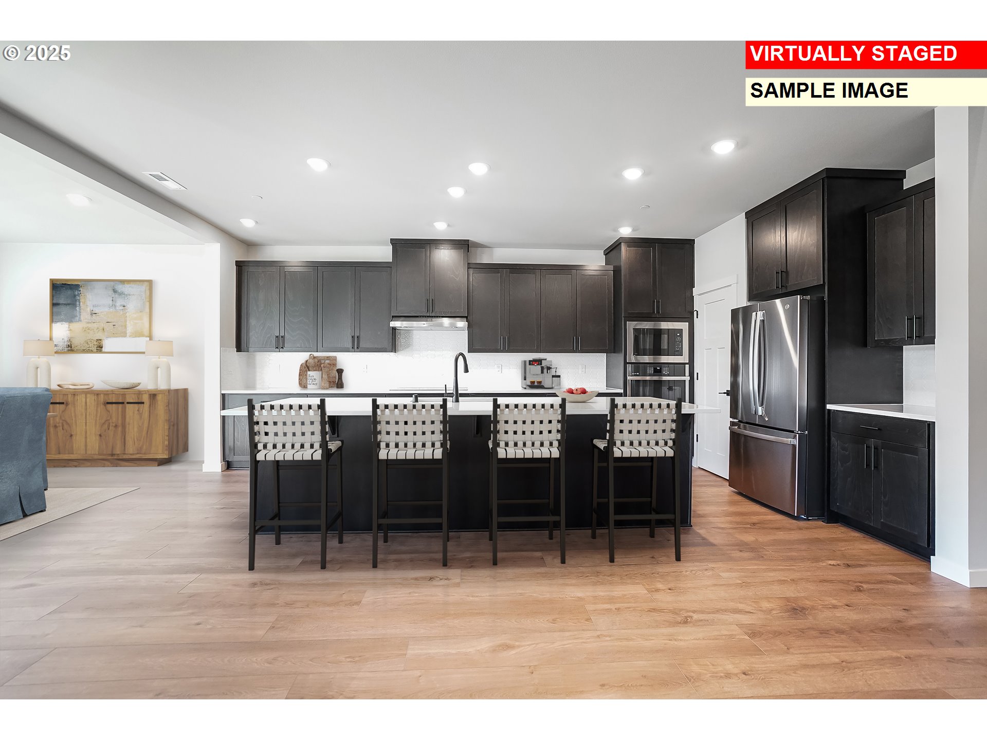 5486 North 88th Avenue Camas, WA 98607 - Photo 6 of 28 a kitchen with refrigerator and chairs