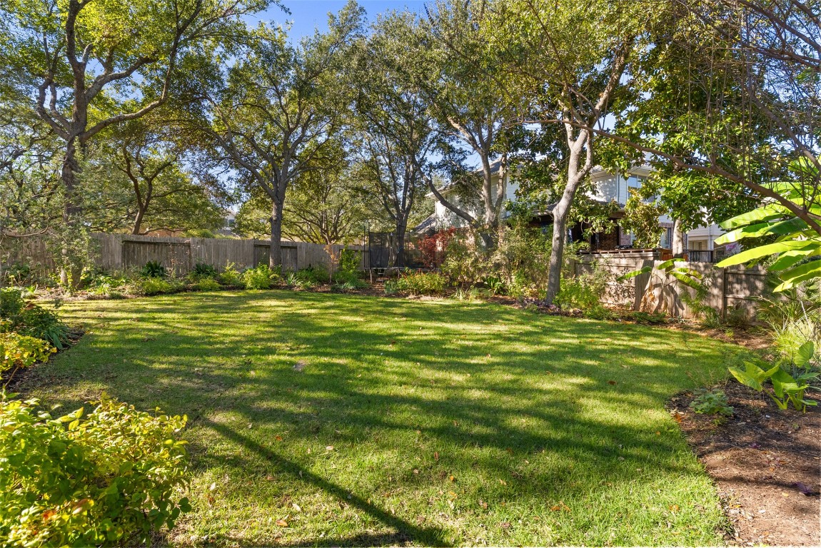 2932 Grimes Ranch Road Austin, TX 78732 - Photo 2 of 38 a view of a green field