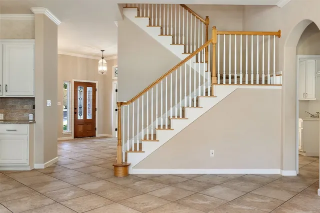 a view of a hallway with staircase