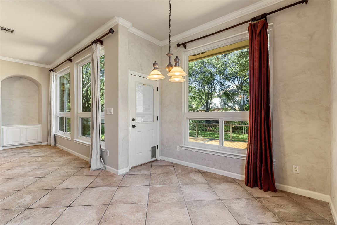 2932 Grimes Ranch Road Austin, TX 78732 - Photo 27 of 38 a view of a room with window and front door