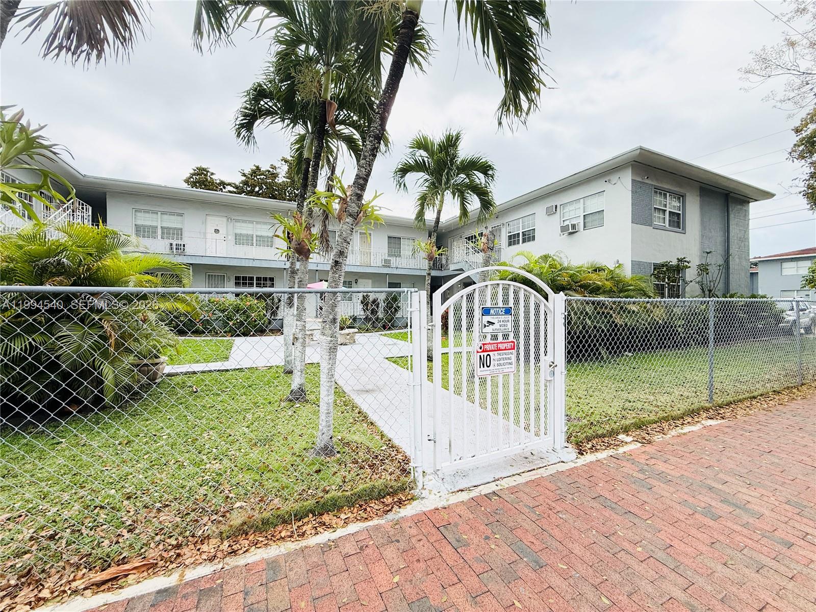 555 Southwest 16th Avenue, Unit 11 Miami, FL 33135 - Photo 18 of 18 a front view of a house with garden