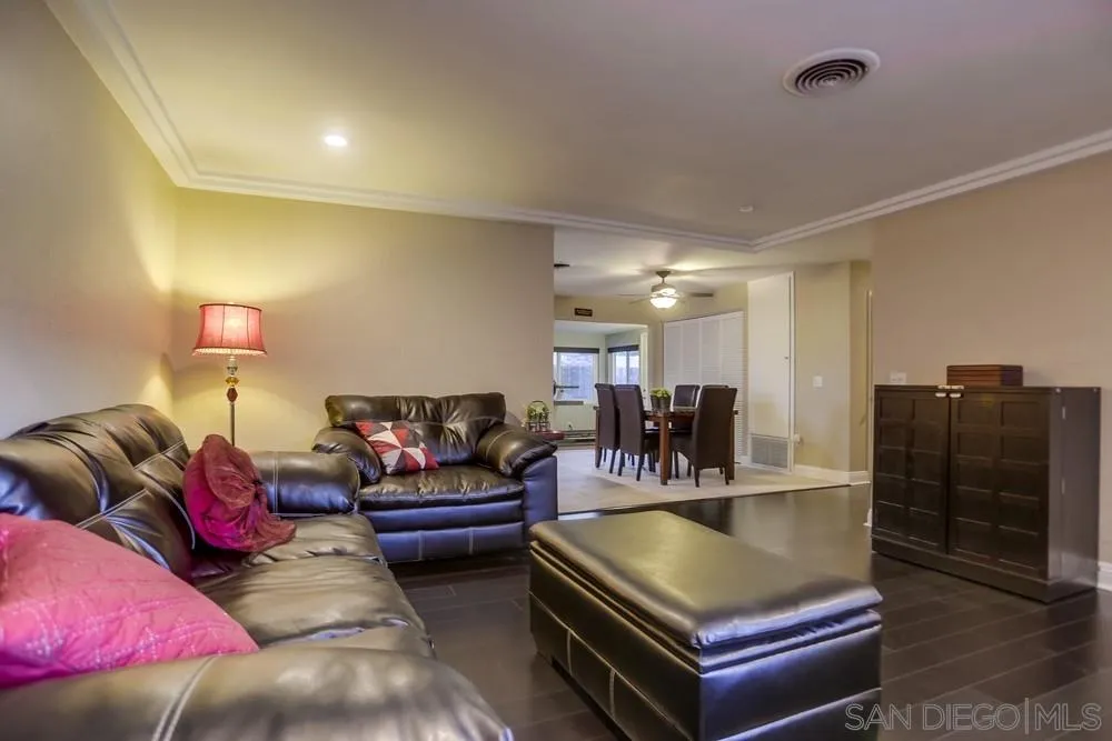 13626 Carriage Road Poway, CA 92064 - Photo 4 of 25 a living room with furniture and kitchen view