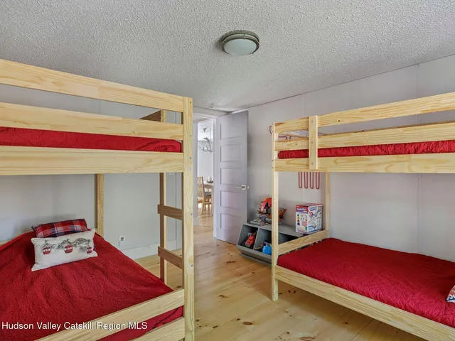 a bathroom with a sink toilet and a mirror