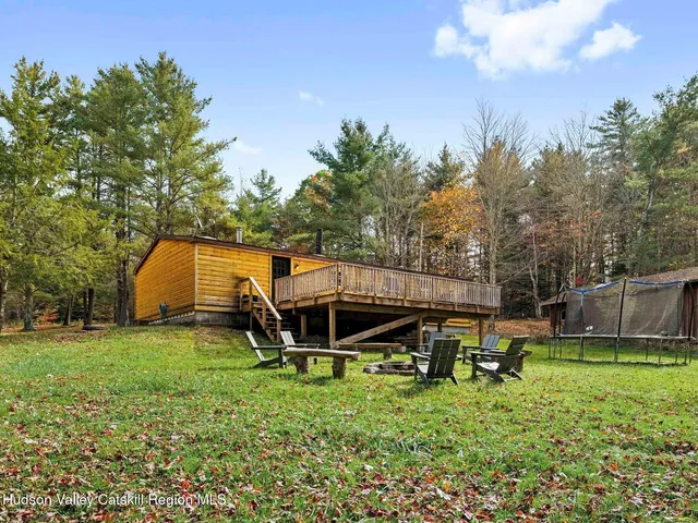 a view of roof deck with patio