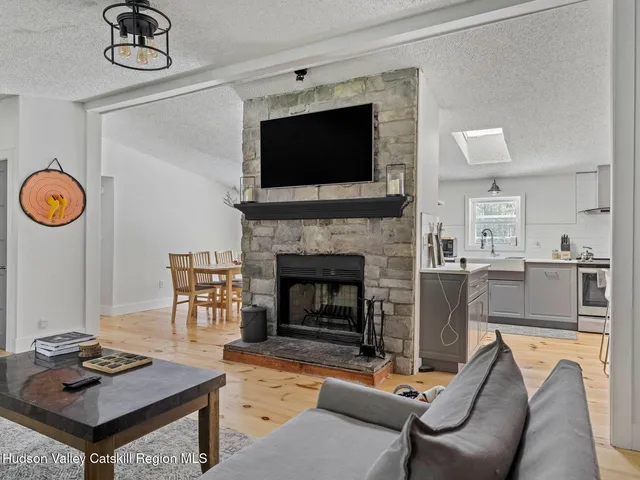 a kitchen with a sink stove and microwave