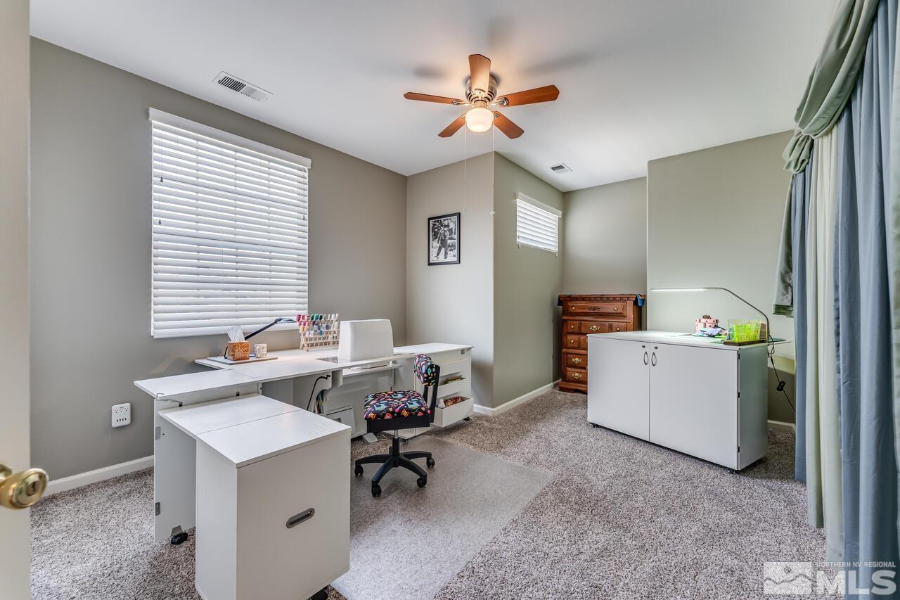 10650 Silver Cliff Way Reno, NV 89521 - Photo 28 of 38 a view of a workspace with furniture
