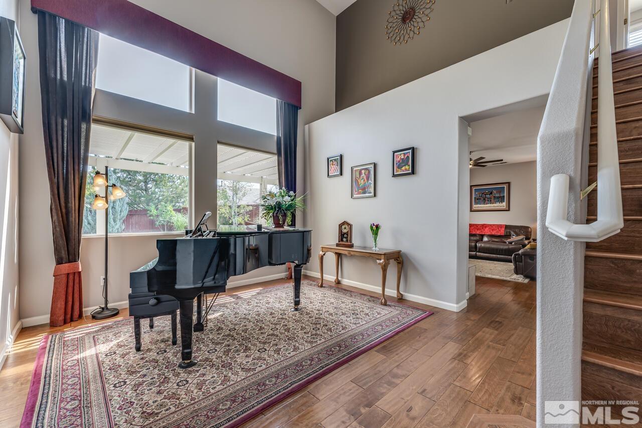 10650 Silver Cliff Way Reno, NV 89521 - Photo 4 of 38 a living room with furniture large window and a table