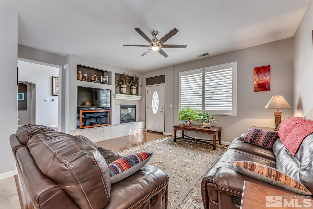 10650 Silver Cliff Way Reno, NV 89521 - Photo 8 of 38 a living room with furniture and a window