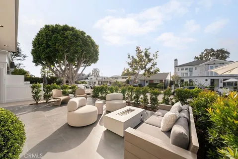 a view of a patio in the backyard