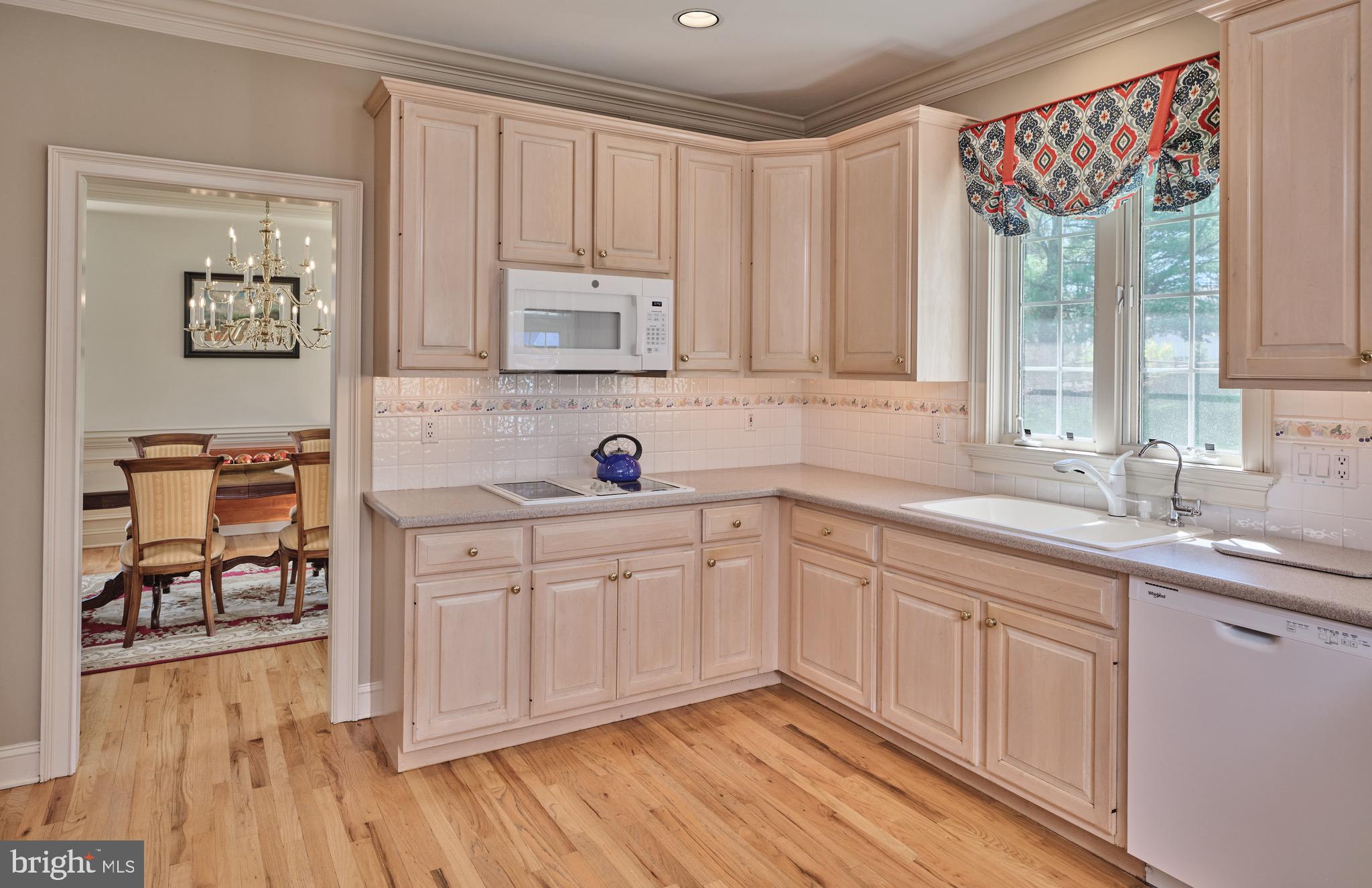 37 Alexanders Court Newtown, PA 18940 - Photo 12 of 50 a kitchen with stainless steel appliances granite countertop a sink and cabinets