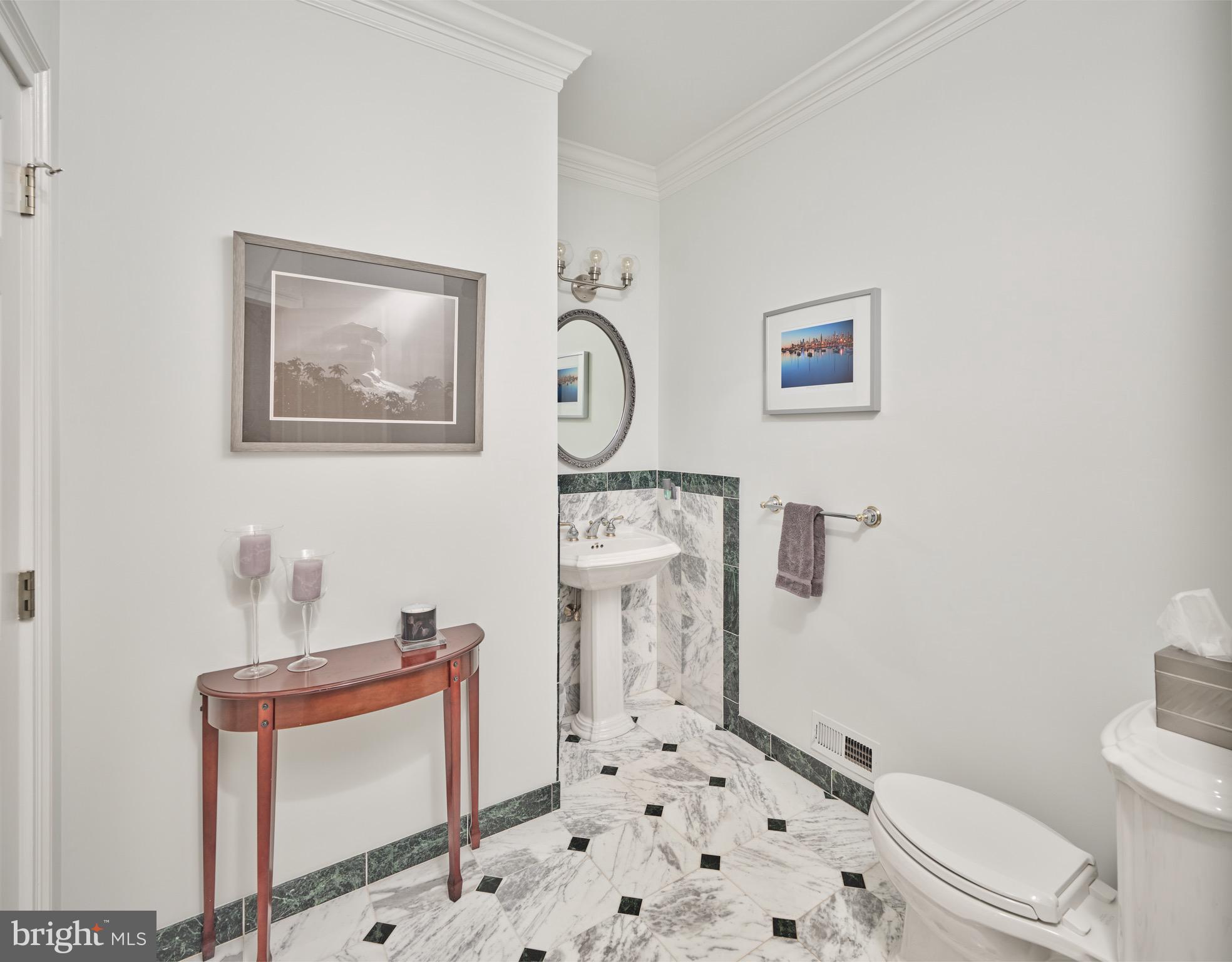 37 Alexanders Court Newtown, PA 18940 - Photo 23 of 50 a bathroom with a toilet sink and mirror