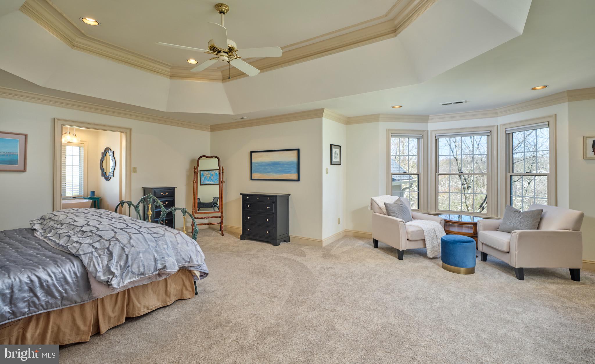 37 Alexanders Court Newtown, PA 18940 - Photo 25 of 50 a spacious bedroom with a large bed couch and windows