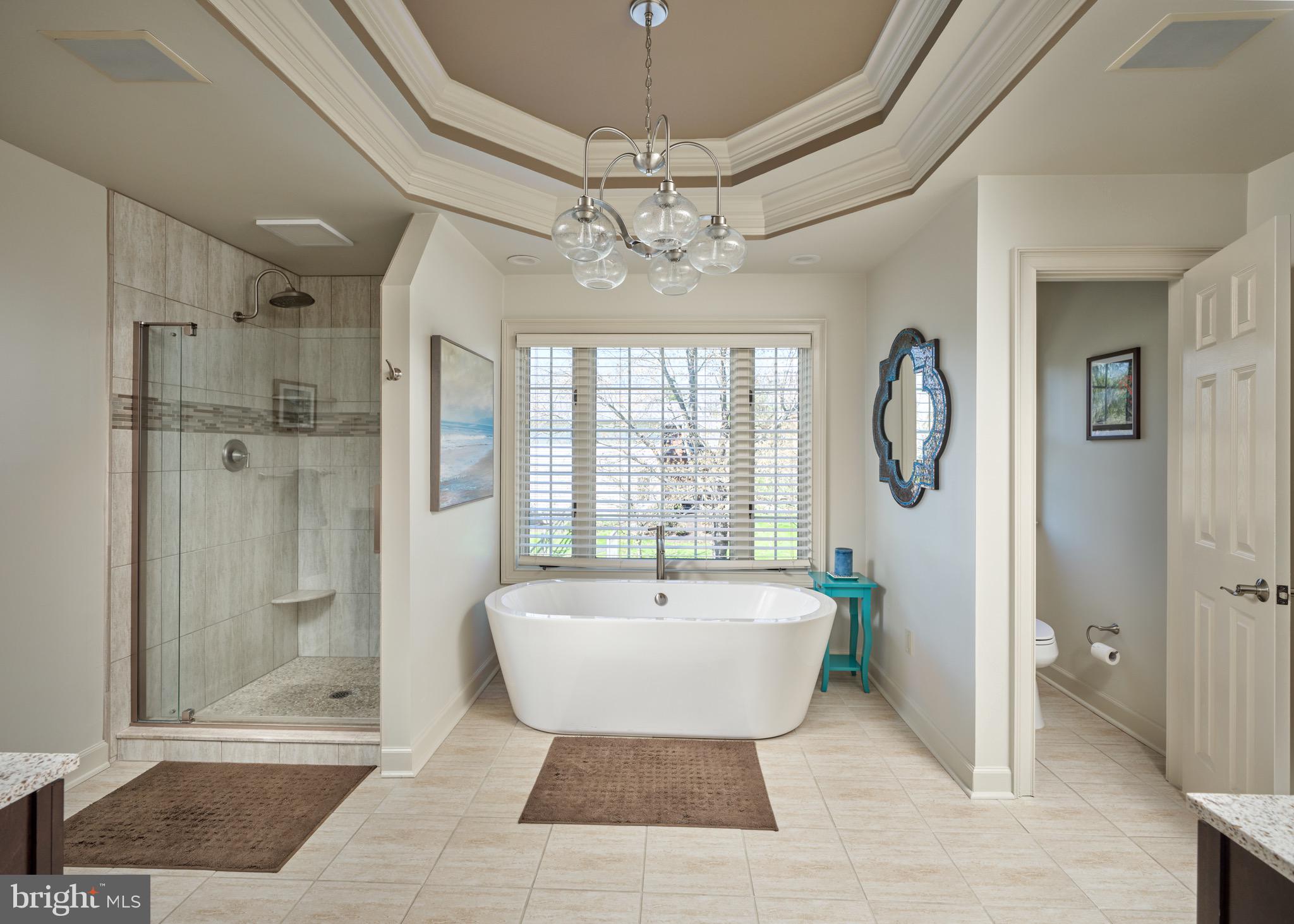 37 Alexanders Court Newtown, PA 18940 - Photo 26 of 50 a spacious bathroom with a bathtub and shower