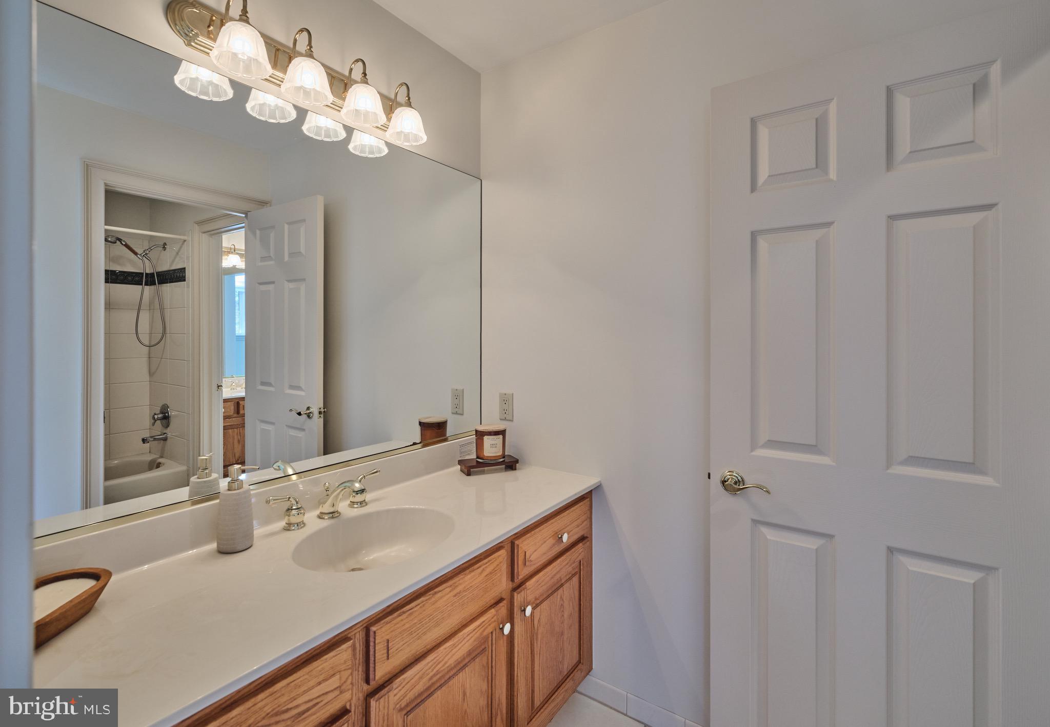 37 Alexanders Court Newtown, PA 18940 - Photo 34 of 50 a bathroom with a double vanity sink and a mirror