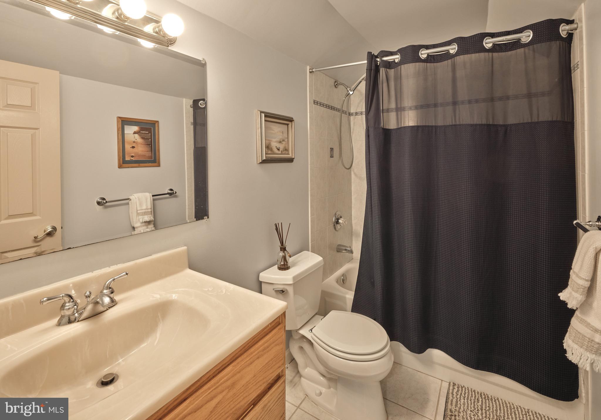 37 Alexanders Court Newtown, PA 18940 - Photo 41 of 50 a bathroom with a sink toilet and shower