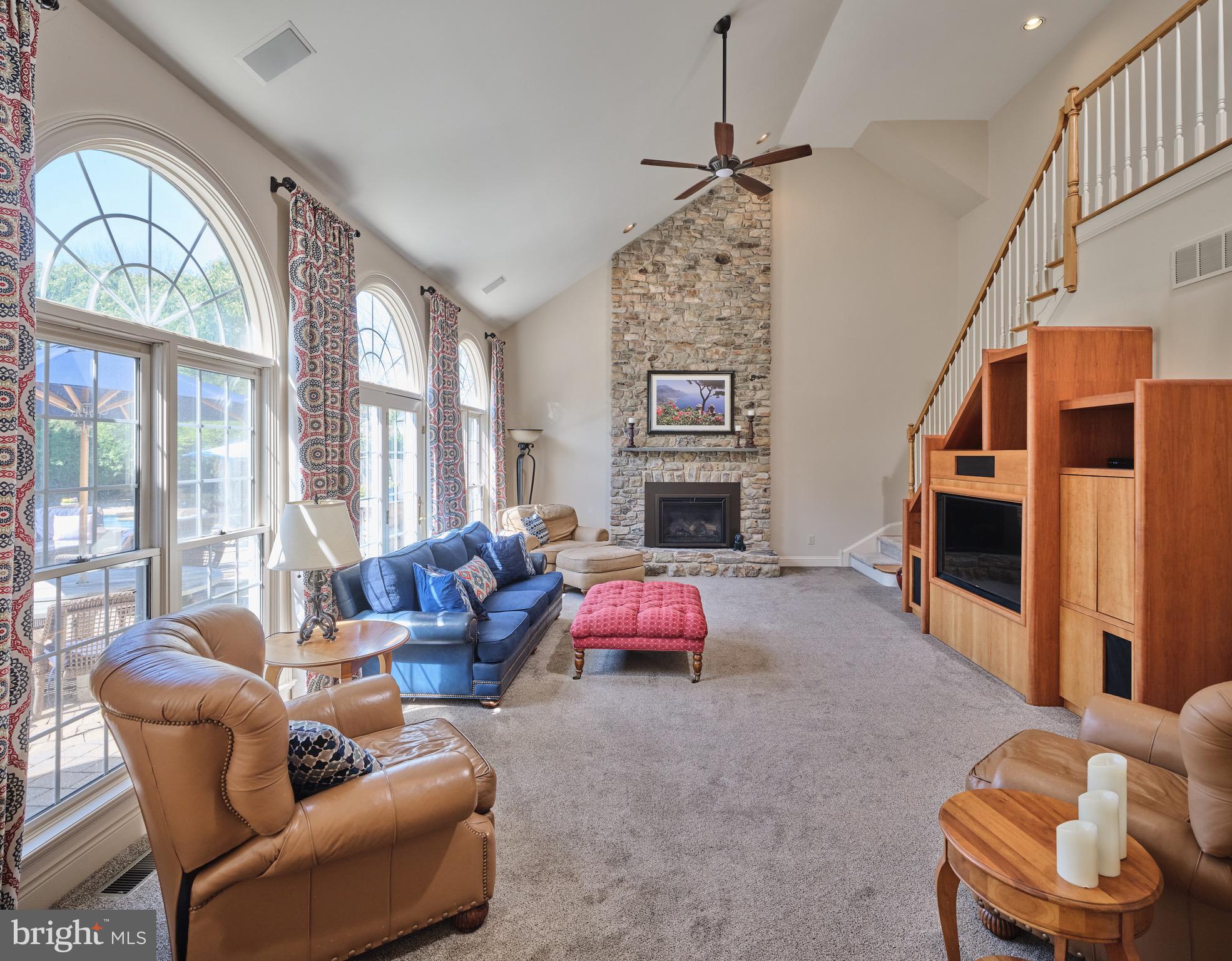 37 Alexanders Court Newtown, PA 18940 - Photo 6 of 50 a living room with furniture fireplace and flat screen tv