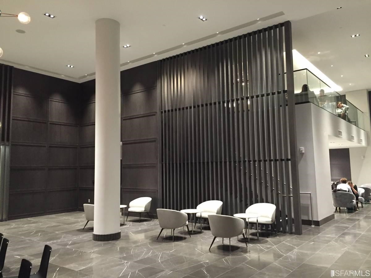 338 Main Street, Unit 27D San Francisco, CA 94105 - Photo 11 of 24 a view of a livingroom with chairs and a couch