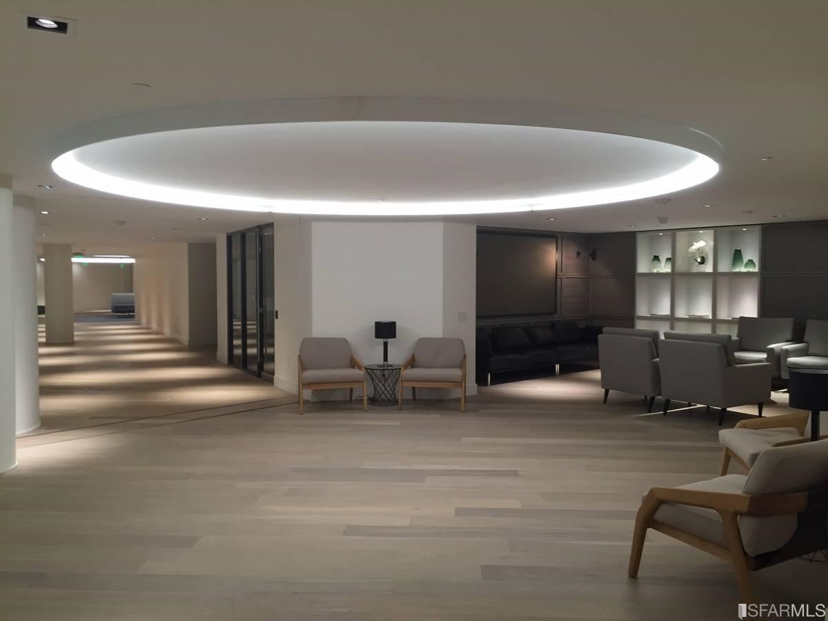 338 Main Street, Unit 27D San Francisco, CA 94105 - Photo 13 of 24 a living room with furniture