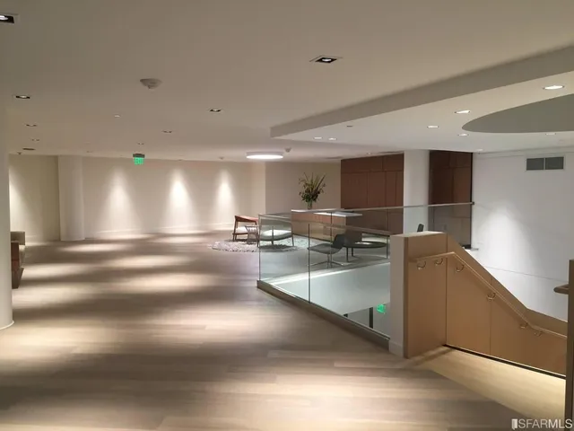 a view of balcony with wooden floor