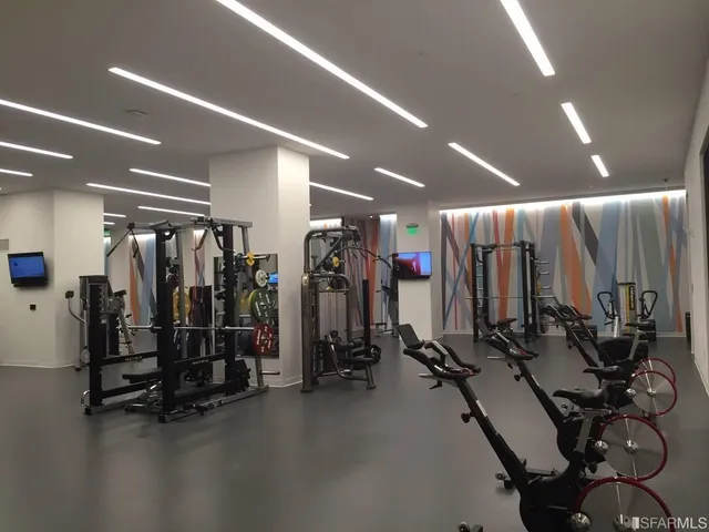 a bathroom with a sink and a large mirror