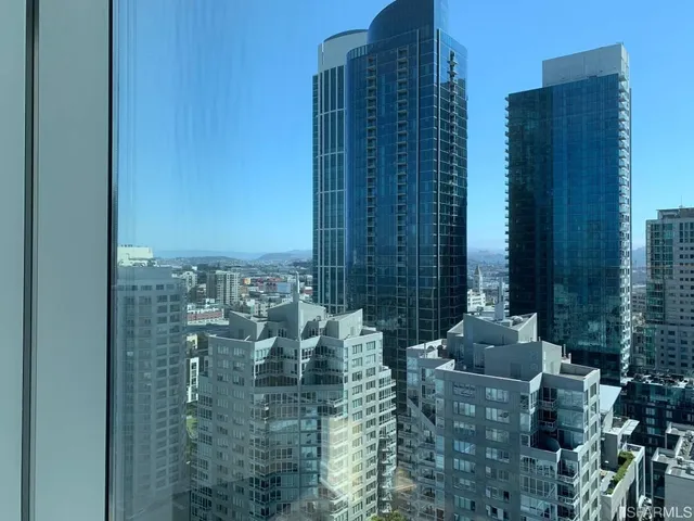 a view of a room that has a window