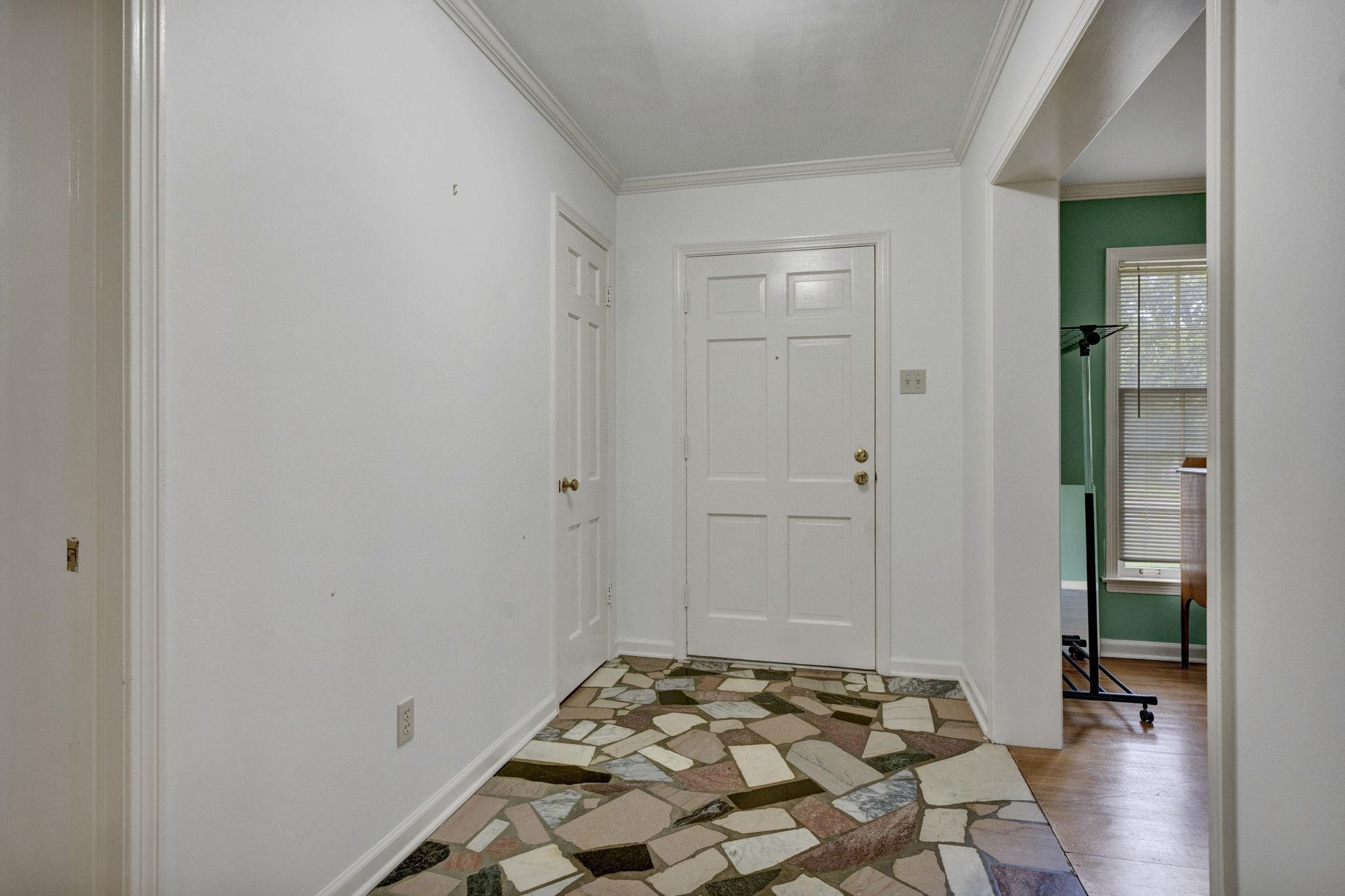 87 North Oak Grove Road Memphis, TN 38120 - Photo 3 of 25 a bedroom with a bed and a rug