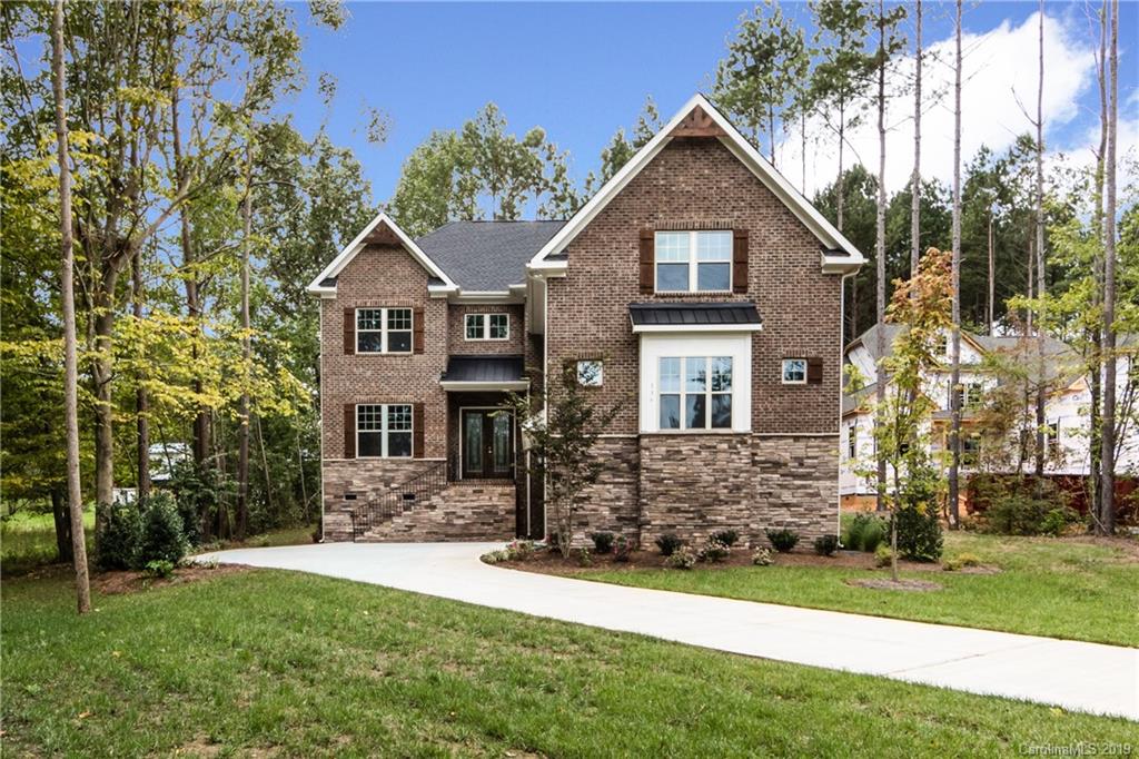 136 Streamwood Road, Unit 17 Troutman, NC 28166 - Photo 3 of 43 front view of a house with a yard