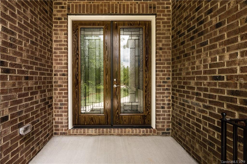 136 Streamwood Road, Unit 17 Troutman, NC 28166 - Photo 4 of 43 a view of a door and a window