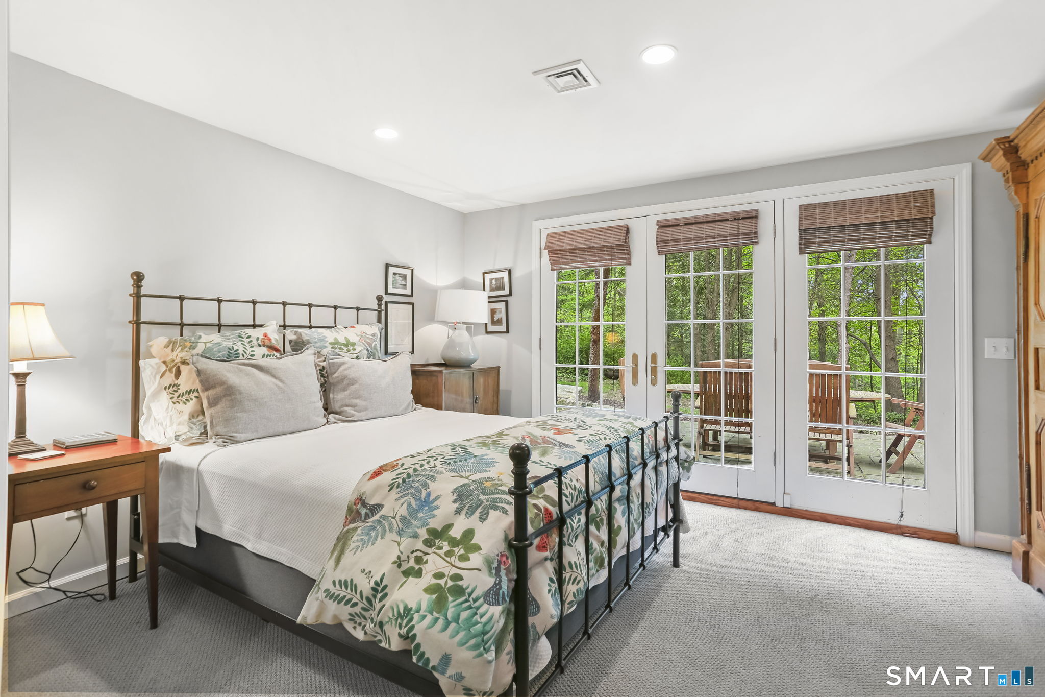 23 Old Stage Coach Road Weston, CT 06883 - Photo 28 of 37 a bedroom with a large bed and a large window