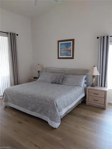 a view of a chair and tables in the patio