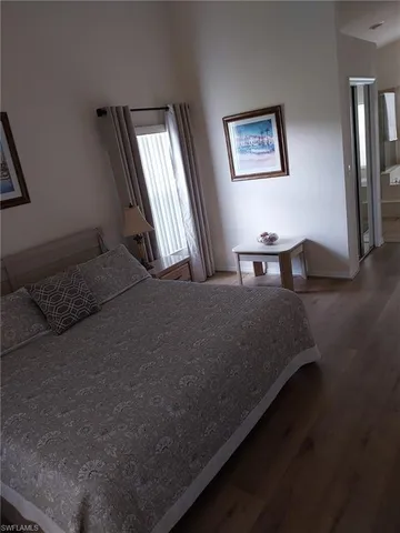 a view of a patio with table and chairs