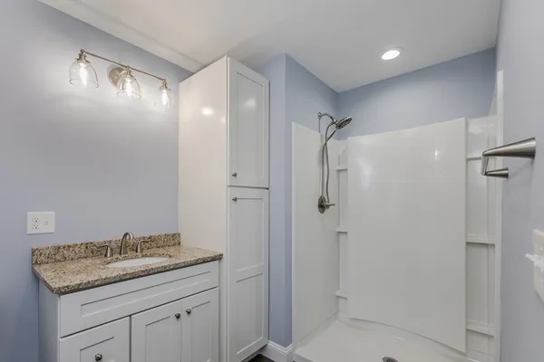 a bathroom with a bath tub