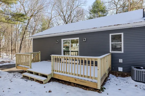 a view of a two chairs in the deck
