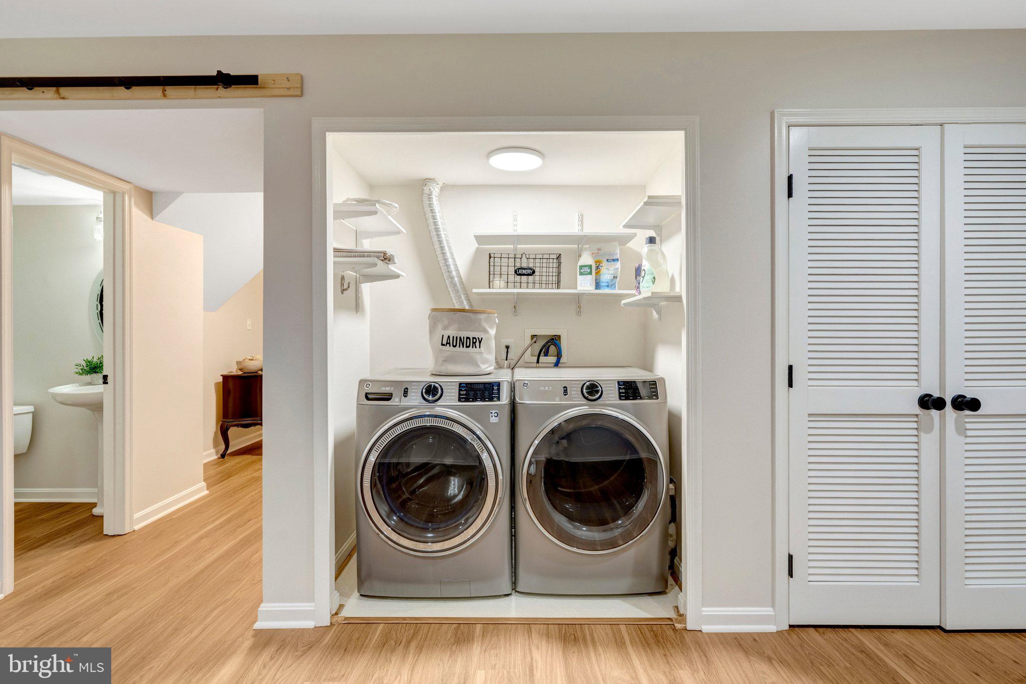 7706 Shadowcreek Terrace Springfield, VA 22153 - Photo 28 of 30 a utility room with dryer and washer