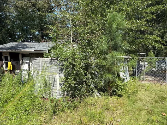 a view of road and trees