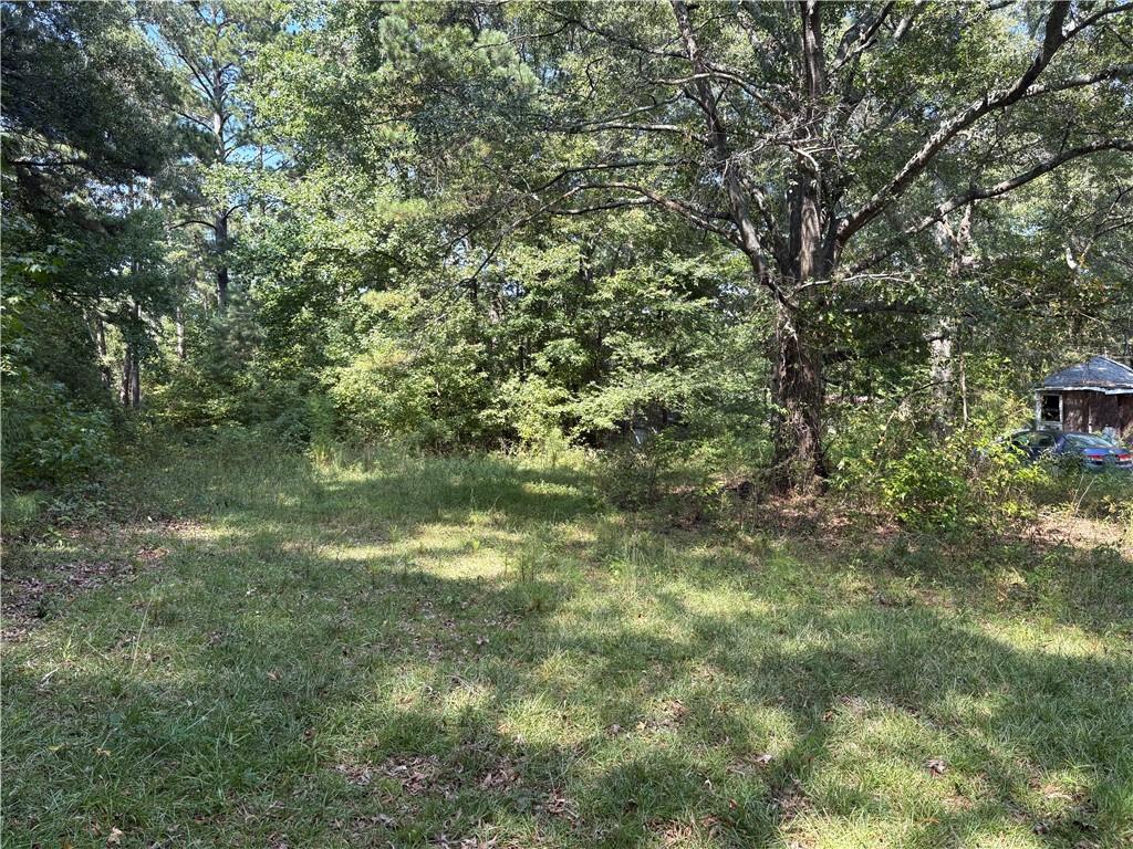 6355 Kimberly Mill Road South Fulton, GA 30349 - Photo 3 of 68 a view of a lake with houses