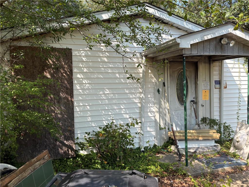 6355 Kimberly Mill Road South Fulton, GA 30349 - Photo 31 of 68 a front view of a house with a yard