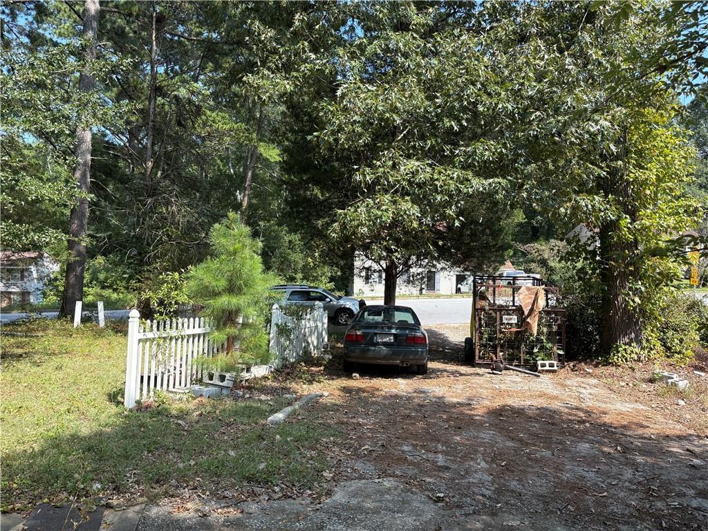 6355 Kimberly Mill Road South Fulton, GA 30349 - Photo 33 of 68 a view of a street with large trees