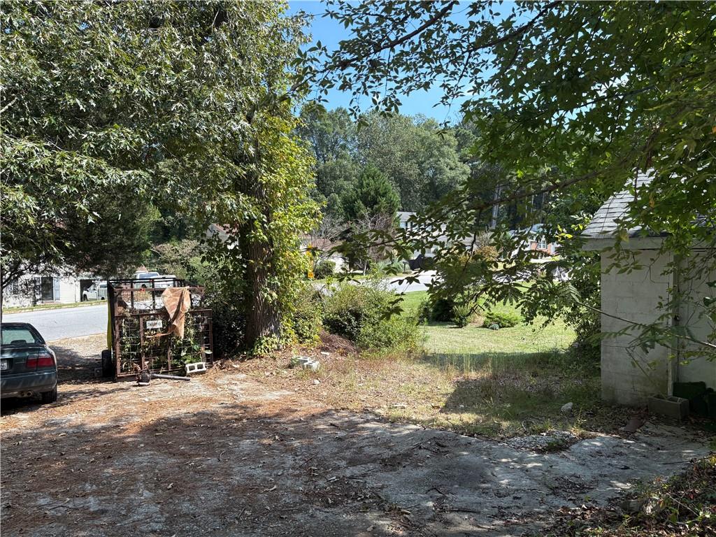 6355 Kimberly Mill Road South Fulton, GA 30349 - Photo 34 of 68 a view of road and trees