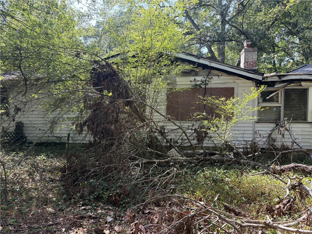 6355 Kimberly Mill Road South Fulton, GA 30349 - Photo 52 of 68 a backyard of a house with lots of green space