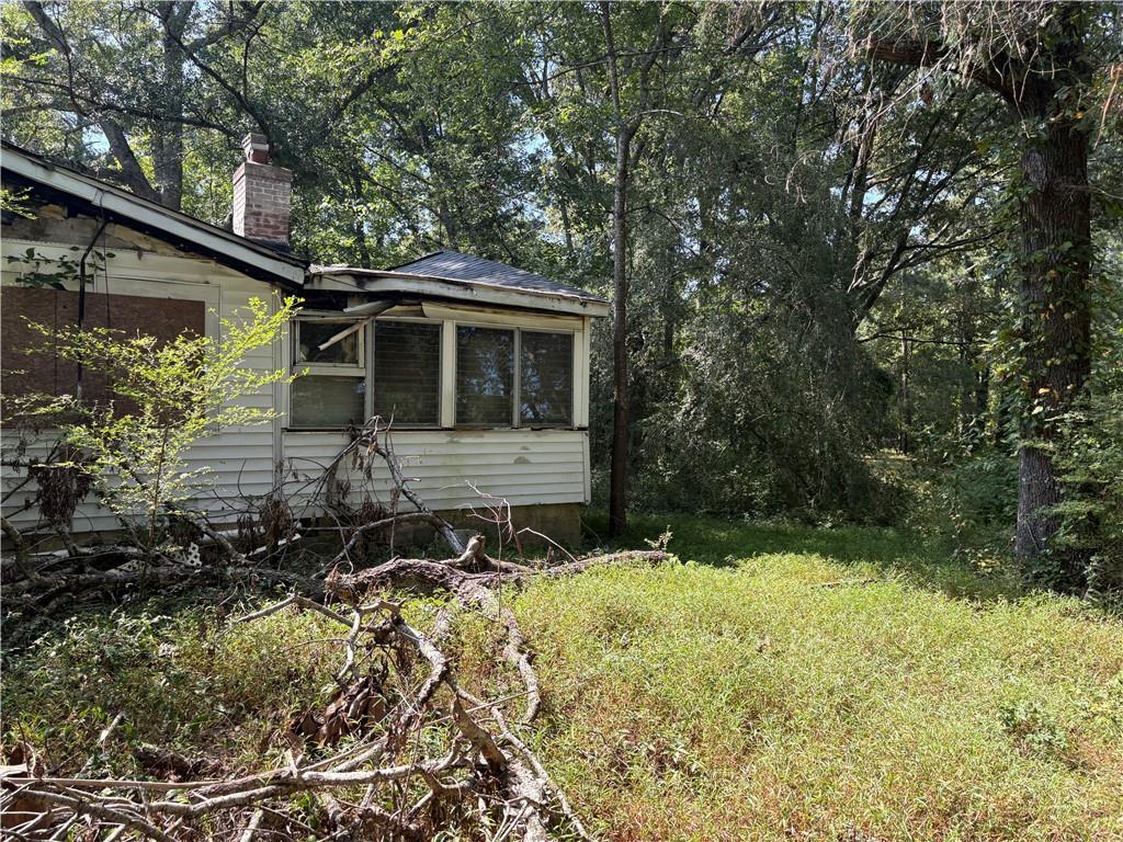 6355 Kimberly Mill Road South Fulton, GA 30349 - Photo 53 of 68 a front view of a house with a yard