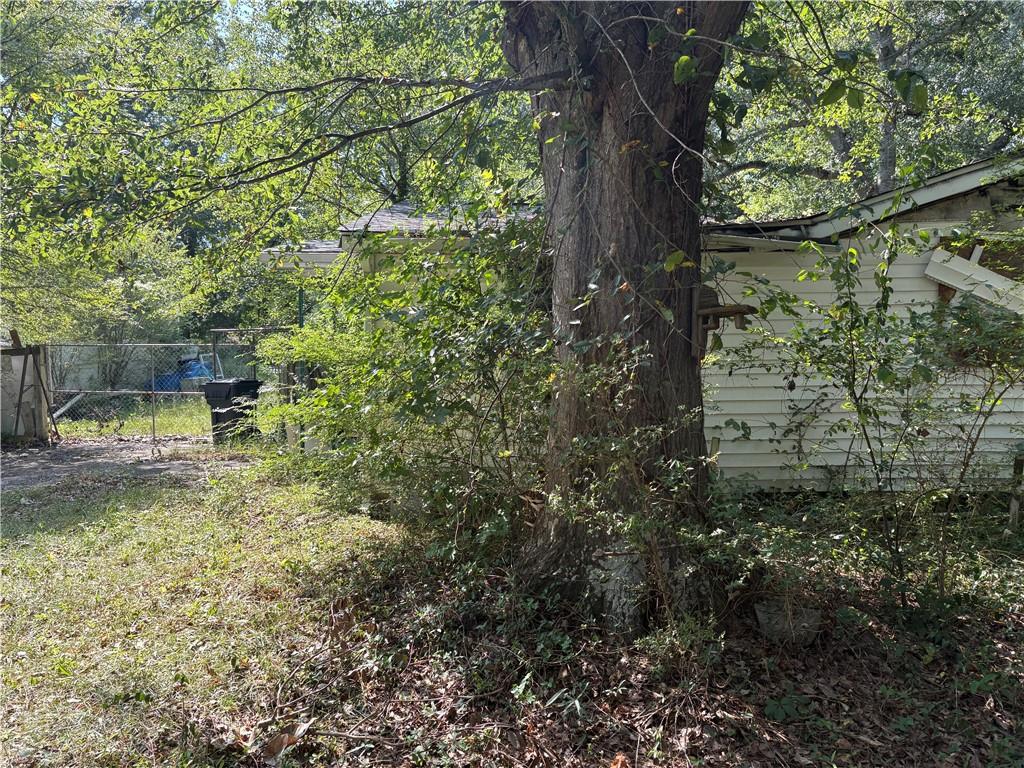 6355 Kimberly Mill Road South Fulton, GA 30349 - Photo 57 of 68 a view of a garden with a tree