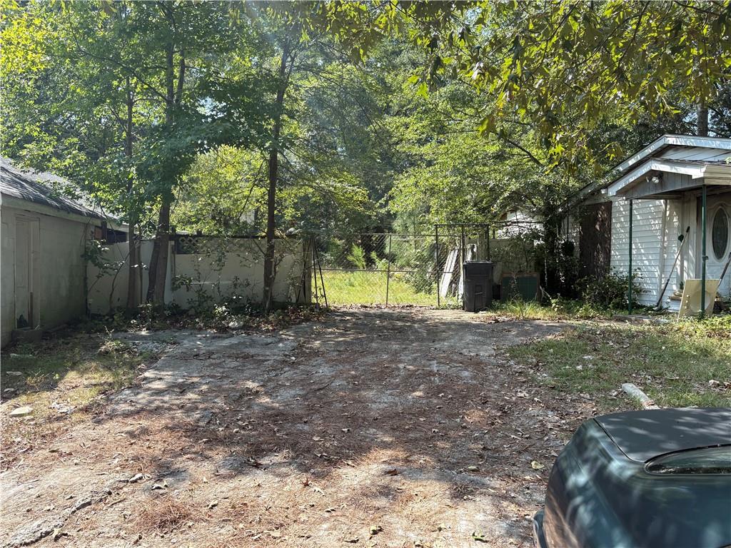 6355 Kimberly Mill Road South Fulton, GA 30349 - Photo 67 of 68 a view of a house with a yard and tree s
