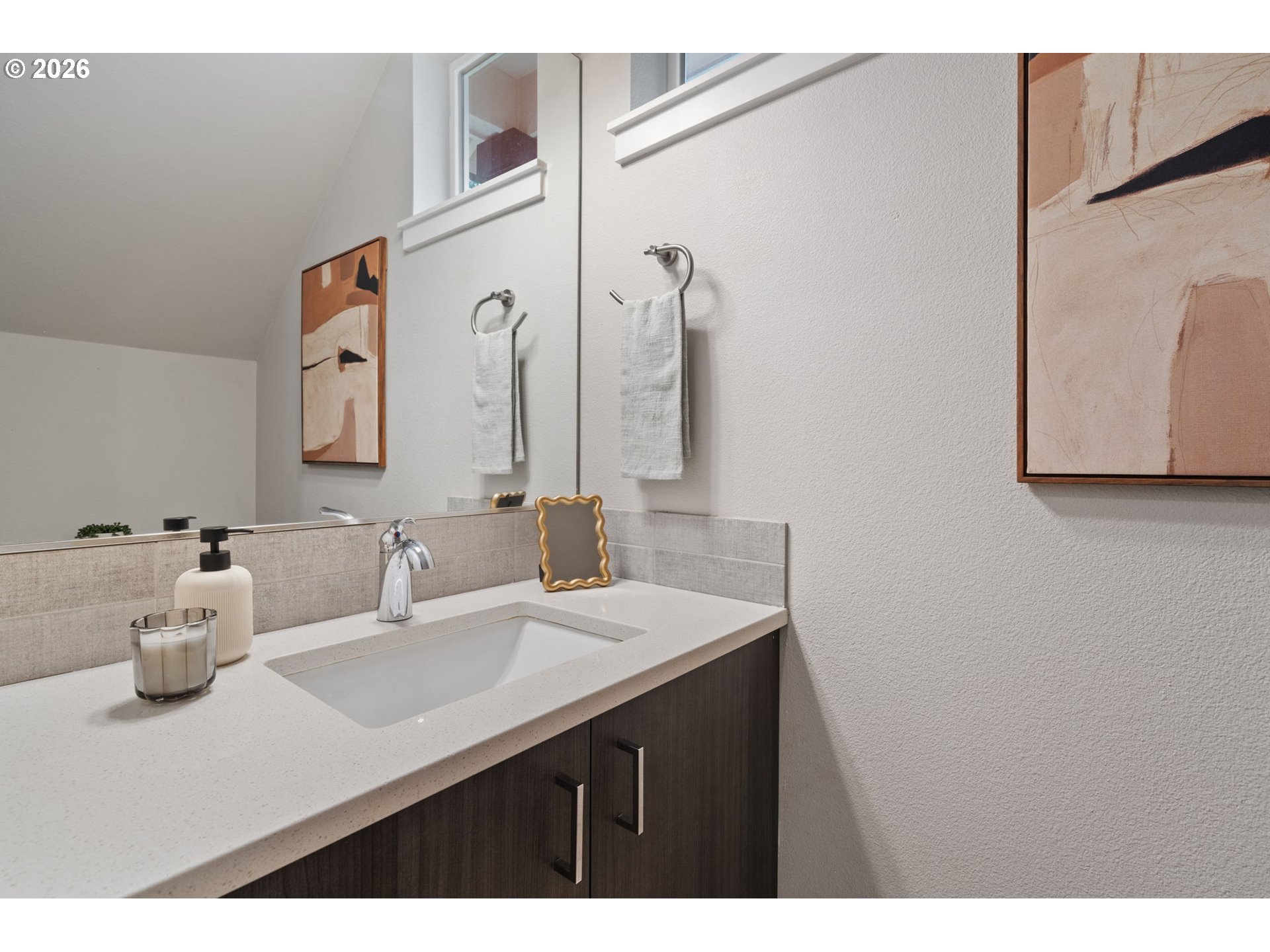 5706 Southeast 134th Place Portland, OR 97236 - Photo 16 of 39 a bathroom with a sink and a mirror