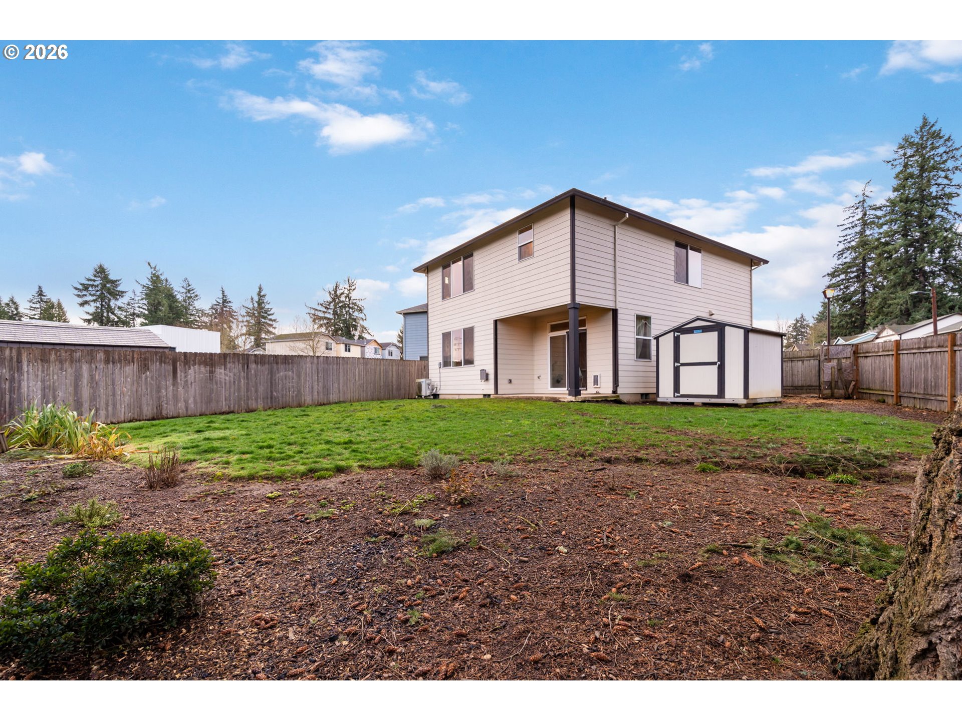 5706 Southeast 134th Place Portland, OR 97236 - Photo 37 of 39 a view of a house with a yard