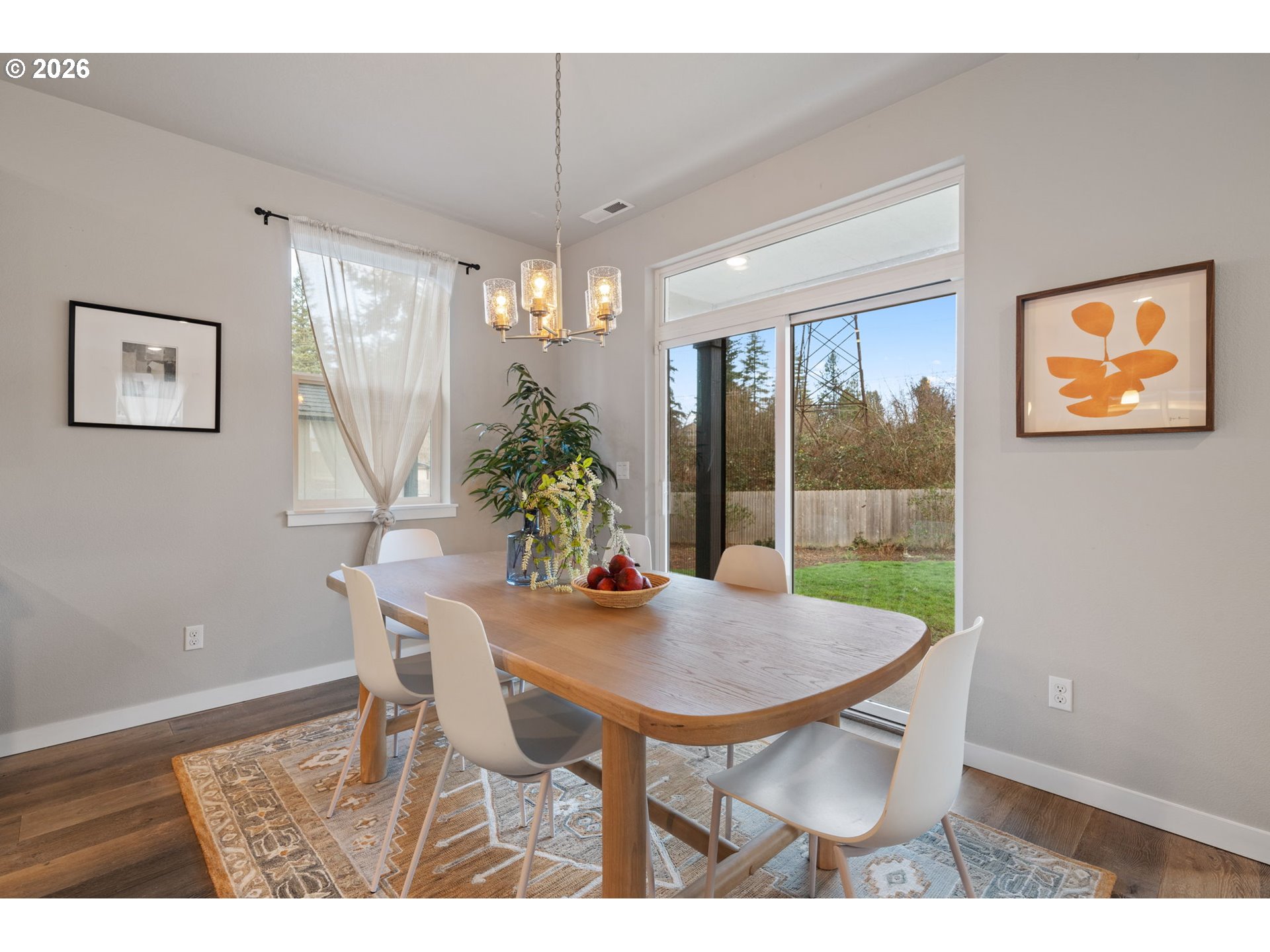 5706 Southeast 134th Place Portland, OR 97236 - Photo 7 of 39 a view of a dining room with furniture window and outside view